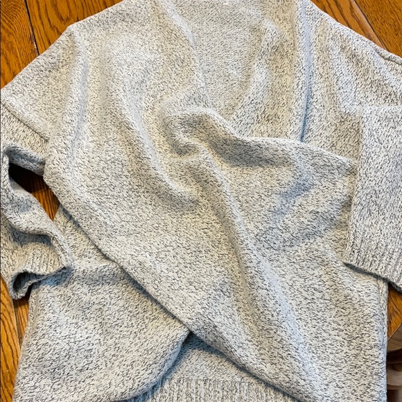 Sweaters - Black & white sweater, crisscross style, medium.